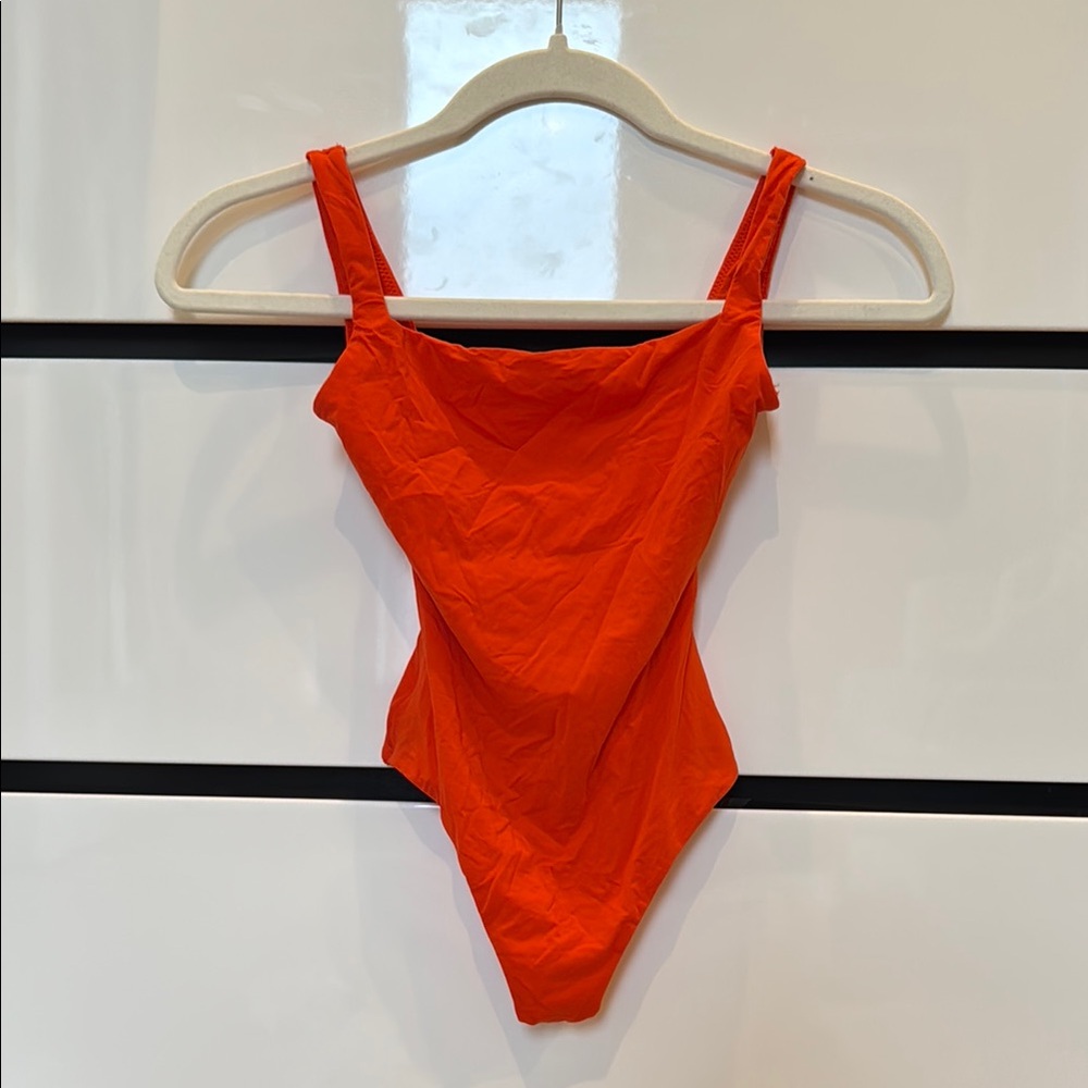 SKIMS Orange High-Cut Bodysuit